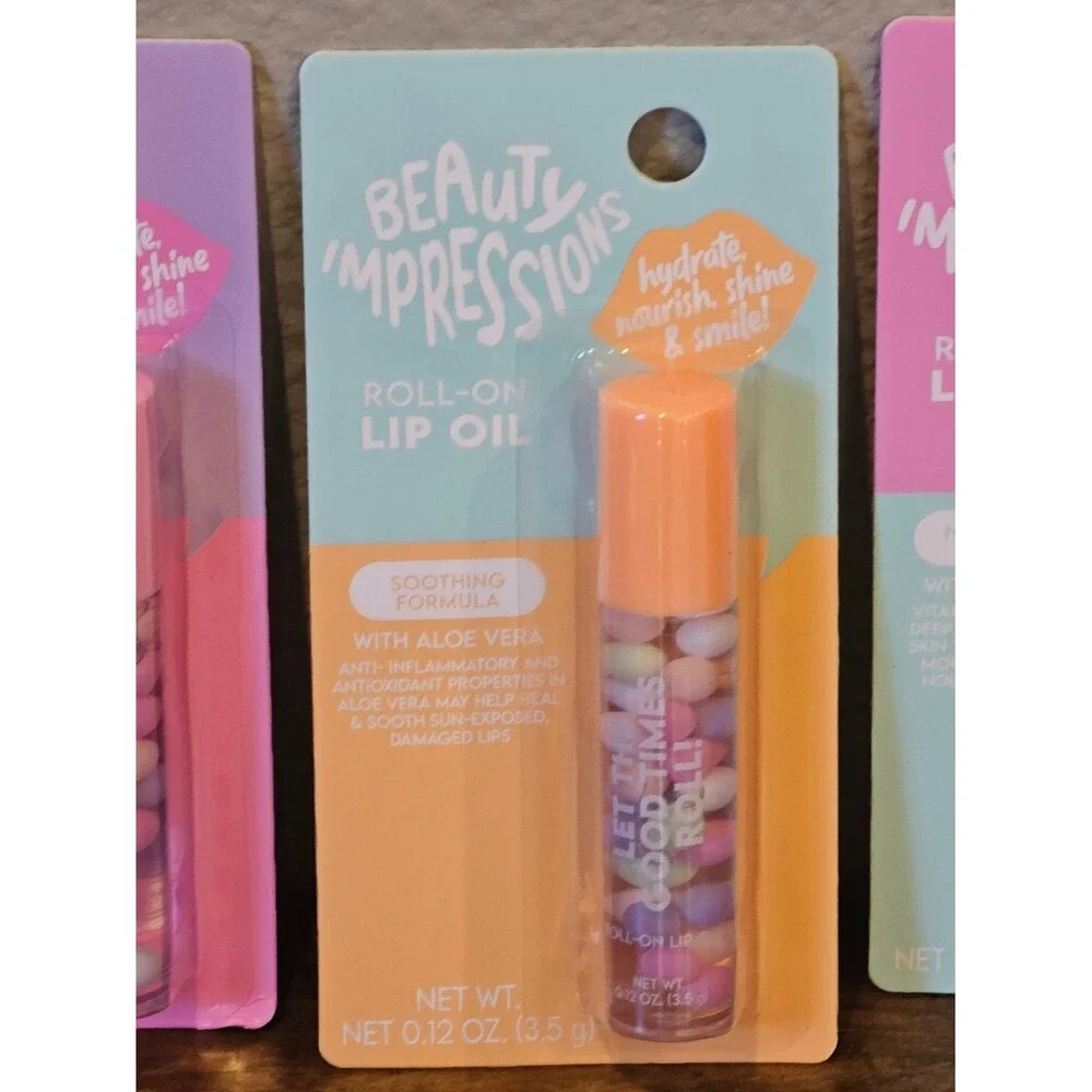 NWT Beauty Impressions Roll-On Lip Oil Bundle